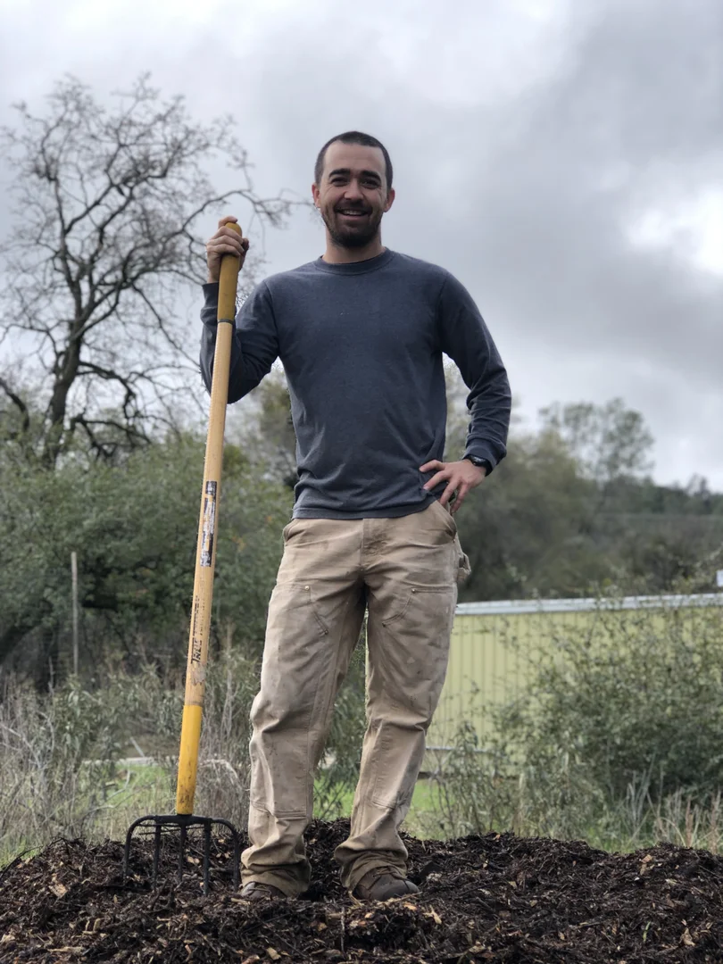 Dean Bartolome smiling outdoors